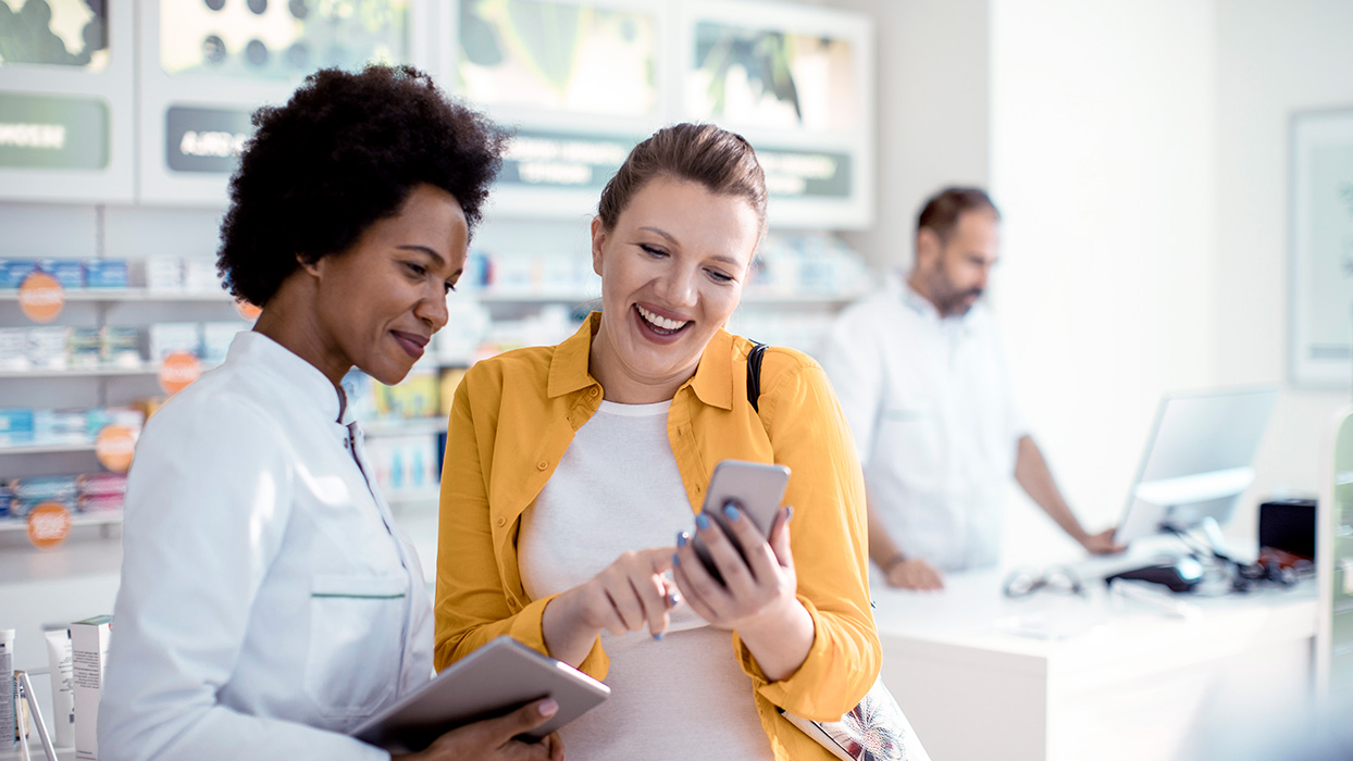 Doctor and patient reviewing benefits information