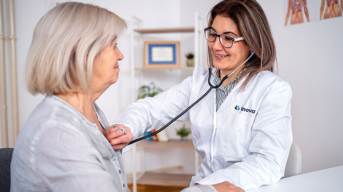 A female doctor with a female senior patient